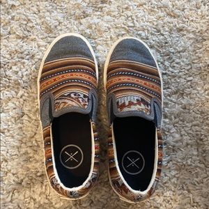 Tribal pattern slip-ons